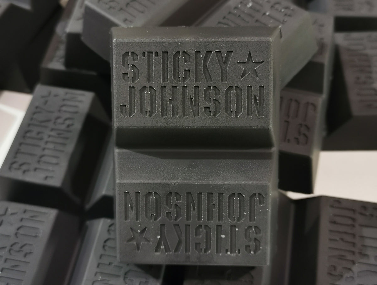 Sticky Johnson Deluxe Black surf wax bar for black surfboards